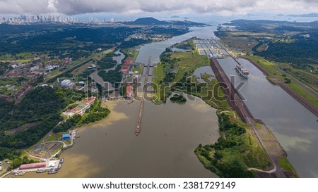 Panama Canal, Canal locks, Maritime Transit, container ship, Gatun Lake, climate change, Panama mining, tug