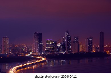 Panama City, Central America, view of Costa Del Este and Corredor Highway at night, with traffic jam of cars and vehicles