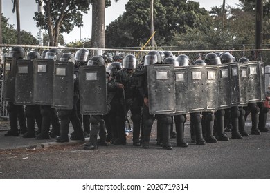 Panama City, Panama; February 17 2021; Riot police in front of Senniaf institution during a protest.