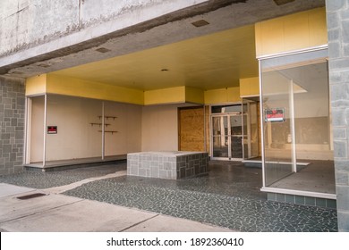 Panama City, FL, US-December 6, 2020: Empty Storefront Of A Shuttered Business On Main Street. Local Businesses Struggle During Difficult Economy.