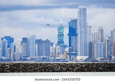 Panama City skyline with modern skyscrapers under a cloudy sky - Powered by Shutterstock