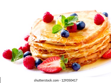 Pancake. Crepes With Berries. Pancakes Stack With Strawberry, Raspberry, Blueberry And Syrupe Isolated On A White Background