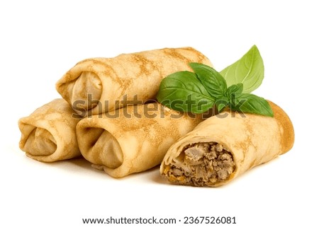Pancake rolls stuffed with ground meat, isolated on white background. High resolution image