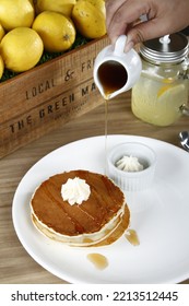 Pancake Stack With Whipped Butter And Maple Syrup