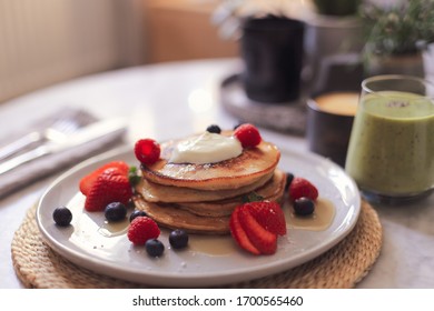 Pancakes With Blueberries , Raspberry’s, Strawberries And Greek Yoghurt.