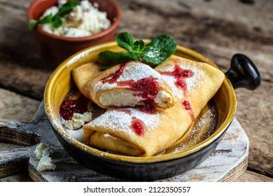 Pancakes Or Crepes With Cottage Cheese Flapjack Thin Cake Ricotta Sweet Dessert Vanilla Cream. Thin Pancakes, Blini. Delicious Breakfast Or Snack. Food Recipe Background. Close Up.