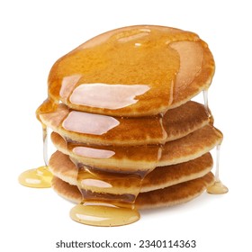 Pancakes poured with honey close-up on a white background. Isolated