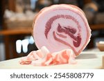 Pancetta arrotolata piacentina is a kind of artisanal rolled bacon produced in Italy in Piacenza Emilia Romagna