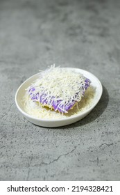 Pancong Cake With Purple Sweet Potato Jam And Cheese, Indonesia Traditional Cake Made Of A Rice Flour And Coconut-based Batter And Cooked In A Special Mold Pan. Taken From Top Angle.