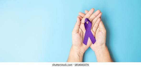 Pancreatic Cancer, world Alzheimer, epilepsy, lupus and domestic violence day Awareness month, Woman holding purple Ribbon for supporting people living. Healthcare and World cancer day concept