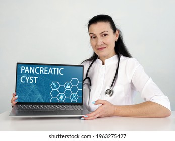  PANCREATIC CYST Text In Menu. Hematologist Looking For Something At Laptop
