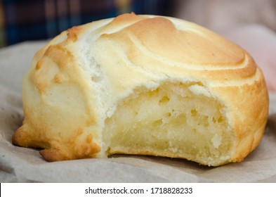 Pandebono or pan de bono is a traditional Colombian bread made of corn flour, cassava starch, cheese, eggs. It's soft and chewy on the inside and crispy on the outside.