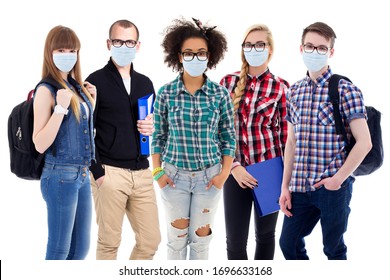 pandemic, health care and education concept - large set of teenagers or students in protective masks standing isolated on white background - Powered by Shutterstock