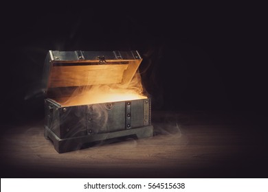 Pandoras Box With Smoke On A Wooden Background