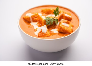 Paneer Butter Masala Or Cheese Cottage Curry Served With Rice And Laccha Paratha