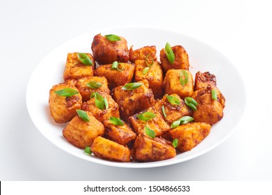 Paneer Manchurian Or Paneer 65 Isolated On White Background. Paneer Manchurian Is Indian Chinese Cuisine Dish With Panner Cheese, Tomatoes, Onion, Soy Sauce.