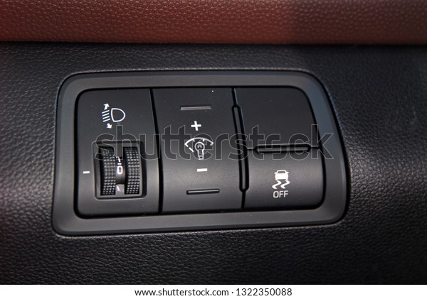 panel with\
buttons on the control panel of\
car
