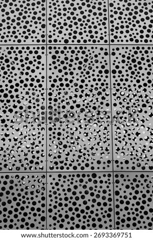The panel layout forms a clean spatial arrangement where repetition and variation generate visual depth, offering a blend of design precision and architectural expression.