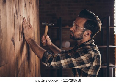 Panel Wooden Board Designer People Person Concept. Side Profile Close Up Photo Portrait Of Serious Concentrated Guy Hammering Nail Into Wall Hold Metallic Tool Equipment Instrument