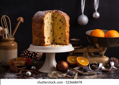 Panettone. Traditional Italian Christmas Cake With Orange, Candied Fruit, Raisins And Cinnamon.