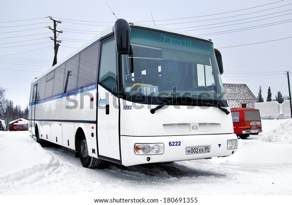 PANGODY, RUSSIA - FEBRUARY 4,
2013: White SOR LC10.5 Arktika interurban coach at the city
street.