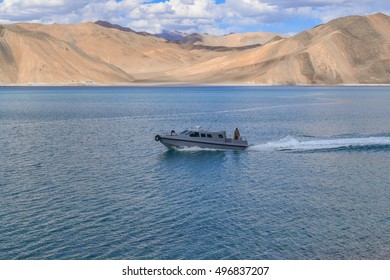 PANGONG LAKE, LEH, INDIA-JULY 6th 2016: Border Security Force Patrol Boat Comes Back After Survey Of Line Of Actual Control Or McMohan Line. Disputed India-China Border Passes Through This Lake.