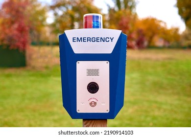 Panic Alarm For Call To Police, Emergency Button In Public Park. Blue Box With Video Camera And Red Blue Warning Light On Top