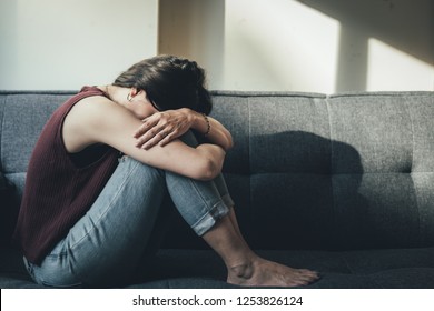 panic attacks young girl sad and fear stressful depressed emotional.crying use hands cover face begging help.stop abusing violence in women,person with health anxiety,people bad feeling down concept - Shutterstock ID 1253826124