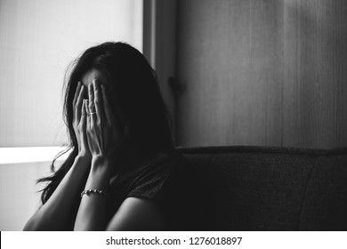 panic attacks young girl sad and fear stressful depressed emotional.crying use hands cover face begging help.stop abusing violence in women,person with health anxiety,people bad feeling down concept