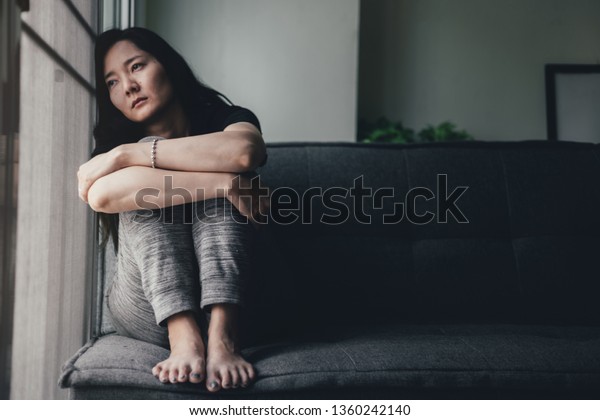 panic attacks young girl sad fear stressful\
depressed emotional.crying use hands cover face begging help.stop\
abusing domestic violence in women,person with health\
anxiety,people bad feeling\
down