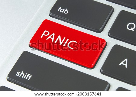 Panic button on keyboard with soft focus