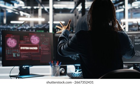 Panicked engineer in AI server facility reacts to hacking incident involving theft of sensitive data. Data center employee alarmed by computer virus triggered by security systems, camera B