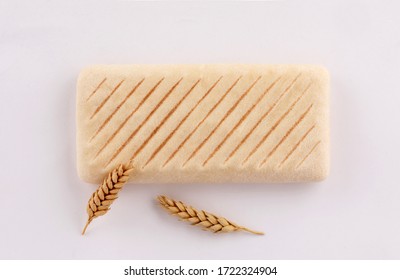 panini bread toasted with ears wheat top view on white background