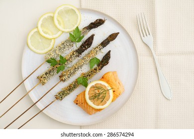 Panko Fried Violet Asparagus Skewers With Salmon And Lemon Slices