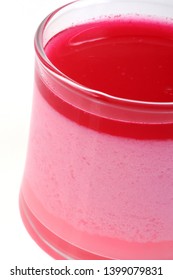 Panna Cotta Close-up With A Strawberry Coulis