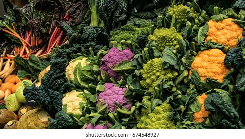 Panning display of different variety of winter vegetables at a food market - Powered by Shutterstock