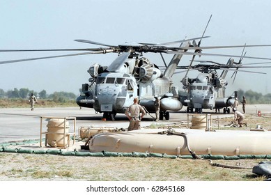PANO AKIL, PAKISTAN - OCT 11: US helicopters ready for supply of relief goods to flood affectees on October 11, 2010 at Pano Akil Cantt, Pakistan.