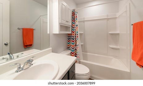 Pano White Bathroom With Wall Cabinet And Colorful Shower Curtain