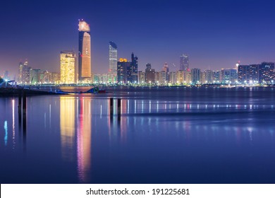 Panorama of Abu Dhabi at night, capital of United Arab Emirates
