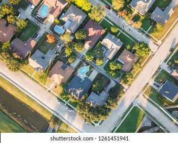 Panorama Aerial Vertical View Residential Houses With Swimming Pool In Carrollton, Texas, USA During Fall Sunset. Top View Row Of Single-family Homes With Garden, Driveway And Attached Garage