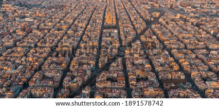 Panorama aerial view of Barcelona Eixample residencial district and famous basilica, Catalonia, Spain