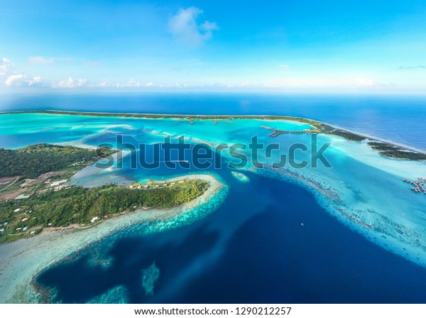 Panorama aerial view of Bora Bora island.\
Luxury hotels and overwater bungalows with blue lagoon, Society\
Islands, Tahiti French\
Polynesia