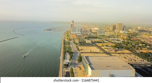 Panorama Aerial View Corpus Christi Downtown From North Of Shoreline Boulevard With Marina And Yachts In The Distance Background. Waterfront Area Of Texas City On Gulf Of Mexico