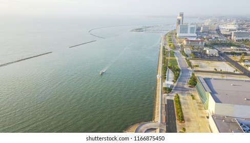 Panorama Aerial View Corpus Christi Downtown From North Of Shoreline Boulevard With Marina And Yachts In The Distance Background. Waterfront Area Of Texas City On Gulf Of Mexico