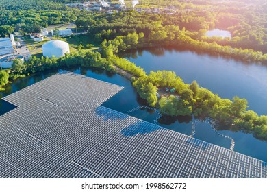 Panorama aerial view of floating farm solar panels cell park platform system on the lake the modern technology