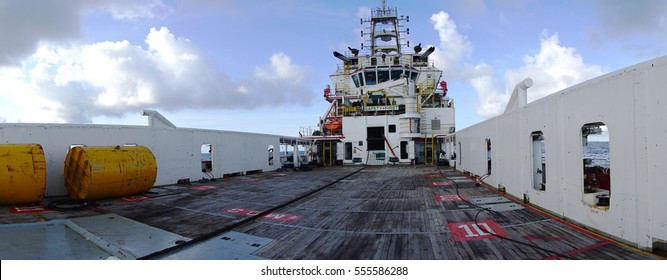 Panorama of Anchor Handling Tug (AHT) vessel. The space where marine crew strorage industrial cargo and perform anchor handling activities.