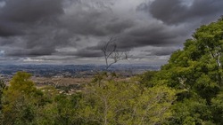 Panorama Of Antananarivo. View From The Royal Hill Of Ambohimanga. City Houses And Roads Are Visible In The Valley. A Mountain Range In The Distance. Cloudy Sky. Madagascar.