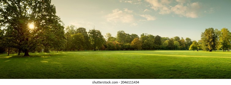 Panorama of autumn city park at sunrise - Shutterstock ID 2046111434
