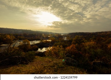 panorama of autumn river under a cloudy blue sky bright yellow trees