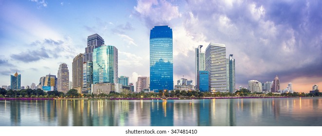 Panorama of Bangkok city downtown at night with reflection of skyline, Bangkok,Thailand